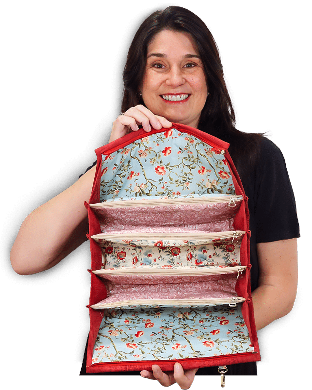 Claudia Barddal segurando a Necessaire 4 em 1 aberta com 4 bolsos